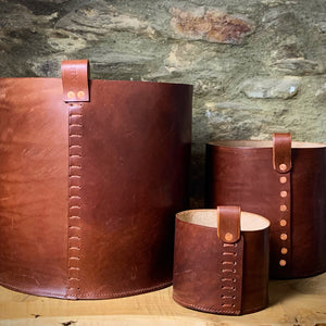 Load image into Gallery viewer, Leather Storage Bin trio in small, medium and large.  Made using Oak bark veg-tanned leather in Dark London Tan.  Hand-stitched base using traditional saddle stitch for extra strength.  Loop attached in choice of ladder stitch or copper rivets.
