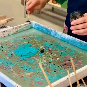 Load image into Gallery viewer, ROCWORX® demonstrating marbling using paints