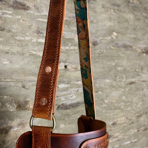 Load image into Gallery viewer, Veg-tanned leather apron detail, hand-stitched abstract marbling pattern leather lined adjustable neck tie.  Attached with solid brass d-ring and hand-forged copper rivets.  Complimentary personalisation, riveted label