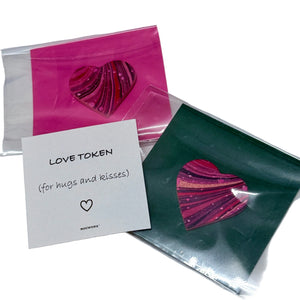 Load image into Gallery viewer, ROCWORX Marbling paper on repurposed leather hearts. Love token for hug or kiss 
