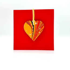 Load image into Gallery viewer, Marbled waxed paper on green leather heart decoration card
