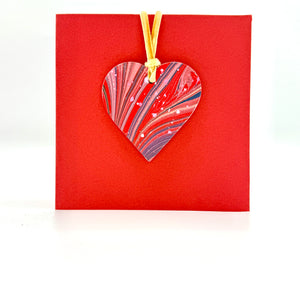Load image into Gallery viewer, Marbled waxed paper on pink leather heart decoration card
