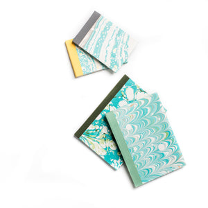 Load image into Gallery viewer, ROCWORX Collection A6 + A5 Marbled Paper Hand-Stitched Sketchbooks in Teal and Green

