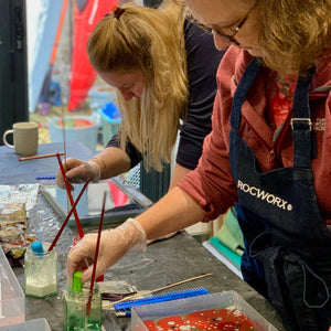 Load image into Gallery viewer, ROCWORX marbling workshop participants creating marbling patterns
