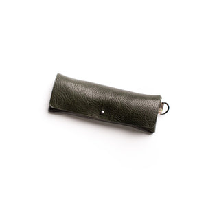 Load image into Gallery viewer, ROCWORX Italian veg-tanned leather in Dark Green. Finished with a simple button and marbled leather loop D-ring
