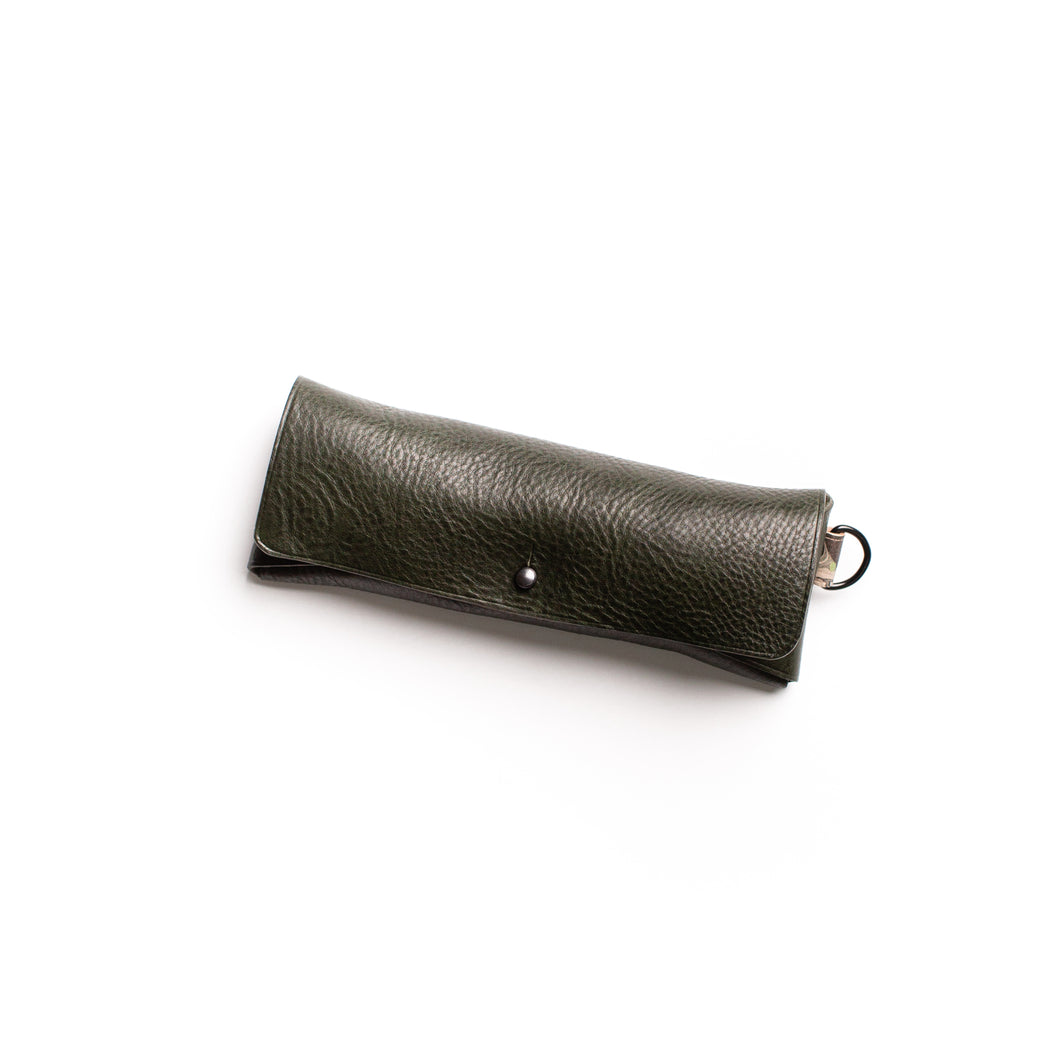 ROCWORX Italian veg-tanned leather in Dark Green. Finished with a simple button and marbled leather loop D-ring