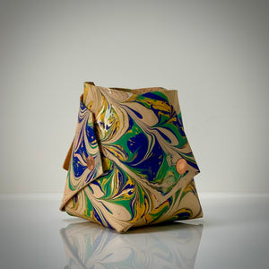 Load image into Gallery viewer, ROCWORX Marbled leather Origami inspired vessel, Abstract pattern in dark green, blue, yellow gold, finished with copper rivets
