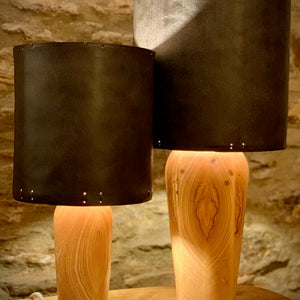 Load image into Gallery viewer, RUGGLESTONE leather lampshades in Dark Oak, size small and large.  On VASE style Ash wooden lamp bases.
