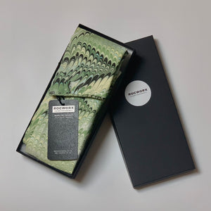 Load image into Gallery viewer, Green marbled scarf in a black box with ROCWORX branding on a gray background
